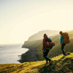 Travel-makes-you-richer-couple-hiking-