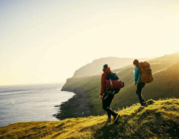 Travel-makes-you-richer-couple-hiking-