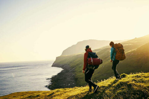 Travel-makes-you-richer-couple-hiking-